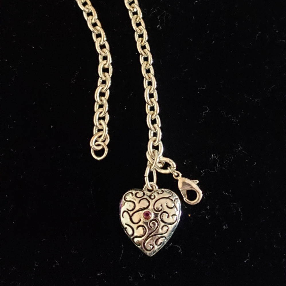 Sterling Silver chain bracelet with a heart locket
